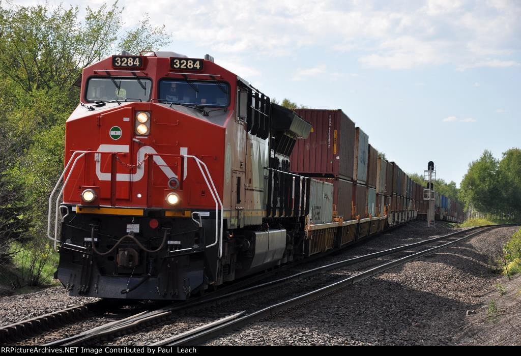 Eastbound stack train eases down the grade